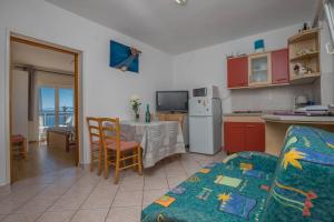 Kuchyň nebo kuchyňský kout v ubytování Apartman Zlatica