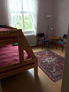Postel nebo postele na pokoji v ubytování Lysekil-Brastad