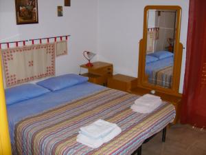 A bed or beds in a room at Bed & Breakfast 5 Di Spade