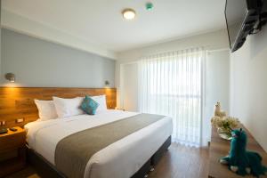 Katil atau katil-katil dalam bilik di Muru Homely Hotel Cusco