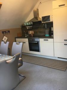 Kuchyň nebo kuchyňský kout v ubytování Ferienwohnung Größing