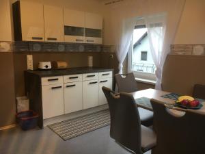 Kuchyň nebo kuchyňský kout v ubytování Ferienwohnung Größing