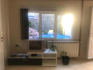 Et tv og/eller underholdning på Cetinje Apartments