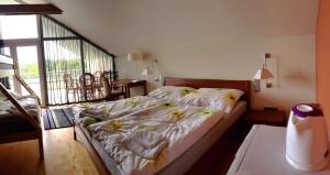 Postel nebo postele na pokoji v ubytování Apartmány Puerto