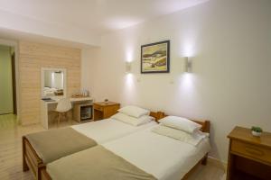 Rúm í herbergi á Hotel Polar Star