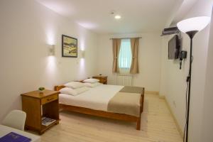 Rúm í herbergi á Hotel Polar Star