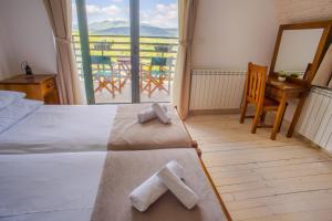 Rúm í herbergi á Hotel Polar Star