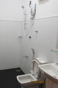 Ванна кімната в The Amora