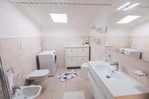 Koupelna v ubytování Hotel Como + 37 fotografií