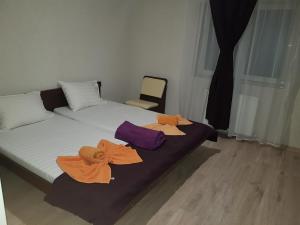 Postel nebo postele na pokoji v ubytování Cool Breeze - Mamaia Nord
