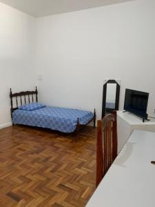 Łóżko lub łóżka w pokoju w obiekcie Casa Max