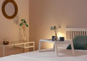Posteľ alebo postele v izbe v ubytovaní Apartamentos Plaza Mayor 35