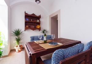 Posedenie v ubytovaní Apartamentos Plaza Mayor 35