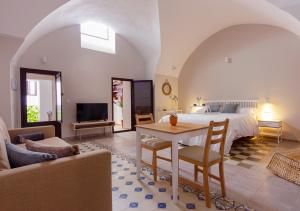 Posedenie v ubytovaní Apartamentos Plaza Mayor 35