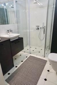 Ένα μπάνιο στο Apartament Batorego 713