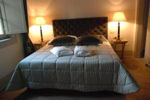 A bed or beds in a room at B&B Pieve Degli Artisti