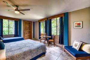 Postel nebo postele na pokoji v ubytování Ananda Guesthouse
