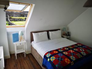 Voodi või voodid majutusasutuse An Creagán Rooms toas