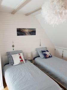 Postel nebo postele na pokoji v ubytování Les Volets Blancs + 59 fotografií