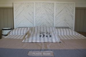 A bed or beds in a room at Lo Chalet dell'Artista