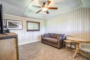 a living room with a couch and a ceiling fan at Grand Lake Lodge in Grand Lake