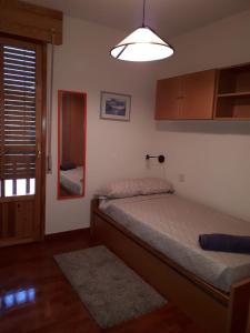 Llit o llits en una habitació de Biescas San Roque