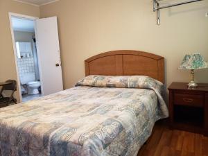 Postel nebo postele na pokoji v ubytování Regent Motel