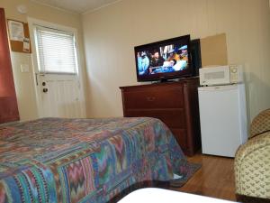 TV a/nebo společenská místnost v ubytování Regent Motel + 37 fotografií