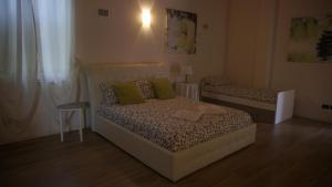 Postel nebo postele na pokoji v ubytování B&B CORTE SANT'ANGELO