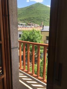 a balcony with a view of a mountain at Biescas San Roque in Biescas