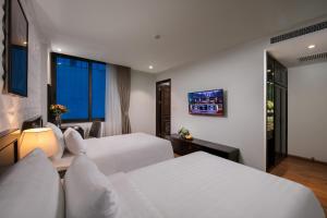 Postel nebo postele na pokoji v ubytování Hotel De La Seine + 37 fotografií