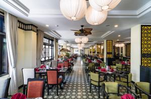 Restoran või mõni muu söögikoht majutusasutuses Le Pavillon Hoi An Luxury Resort & Spa