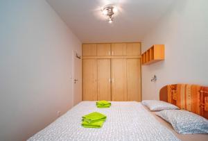Postel nebo postele na pokoji v ubytování Horský Apartmán Klínovec 3