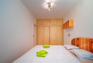 Postel nebo postele na pokoji v ubytování Horský Apartmán Klínovec 3