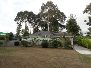 Ein Garten an der Unterkunft Khanom Garden Suite