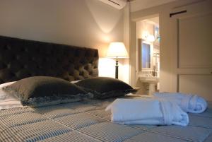 A bed or beds in a room at B&B Pieve Degli Artisti