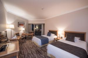 Postel nebo postele na pokoji v ubytování Xiyuan Hotel