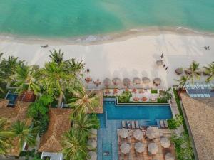 an aerial view of a resort with a pool and the beach at Banana Fan Sea Resort in Chaweng