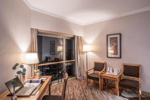 TV a/nebo společenská místnost v ubytování Xiyuan Hotel