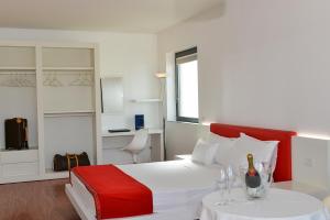 A bed or beds in a room at Stay Michelangelo Jesolo Only Adults