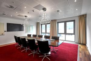 Televisyen dan/atau pusat hiburan di Copenhagen Island Hotel