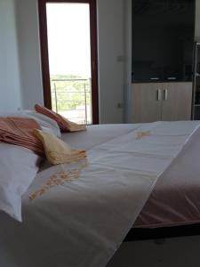 Postel nebo postele na pokoji v ubytování Apartments Kordić