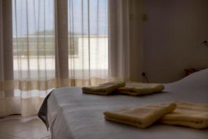 Postel nebo postele na pokoji v ubytování Apartments Kordić