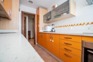 Kuchyňa alebo kuchynka v ubytovaní Apartamento Paseo Maritimo 27