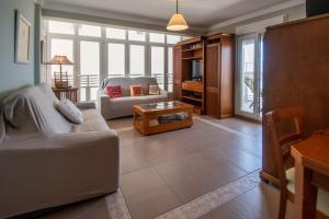 Posedenie v ubytovaní Apartamento Paseo Maritimo 27