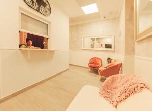 A seating area at Hostal Pio Centro
