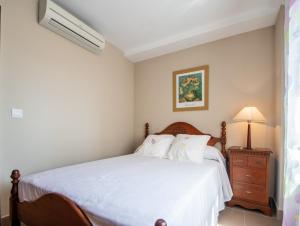 Posteľ alebo postele v izbe v ubytovaní Apartamento Paseo Maritimo 27