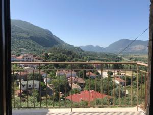 a view from a window of a town with mountains at Panoraia Maisons in Margarítion