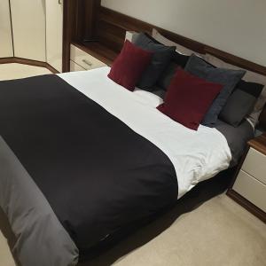 Ліжко або ліжка в номері Hullidays - The Sawmill Suite
