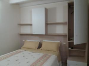 Postel nebo postele na pokoji v ubytování B&B Isola Verde